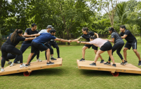 Teammates spotting a colleague on an outdoor balance beam